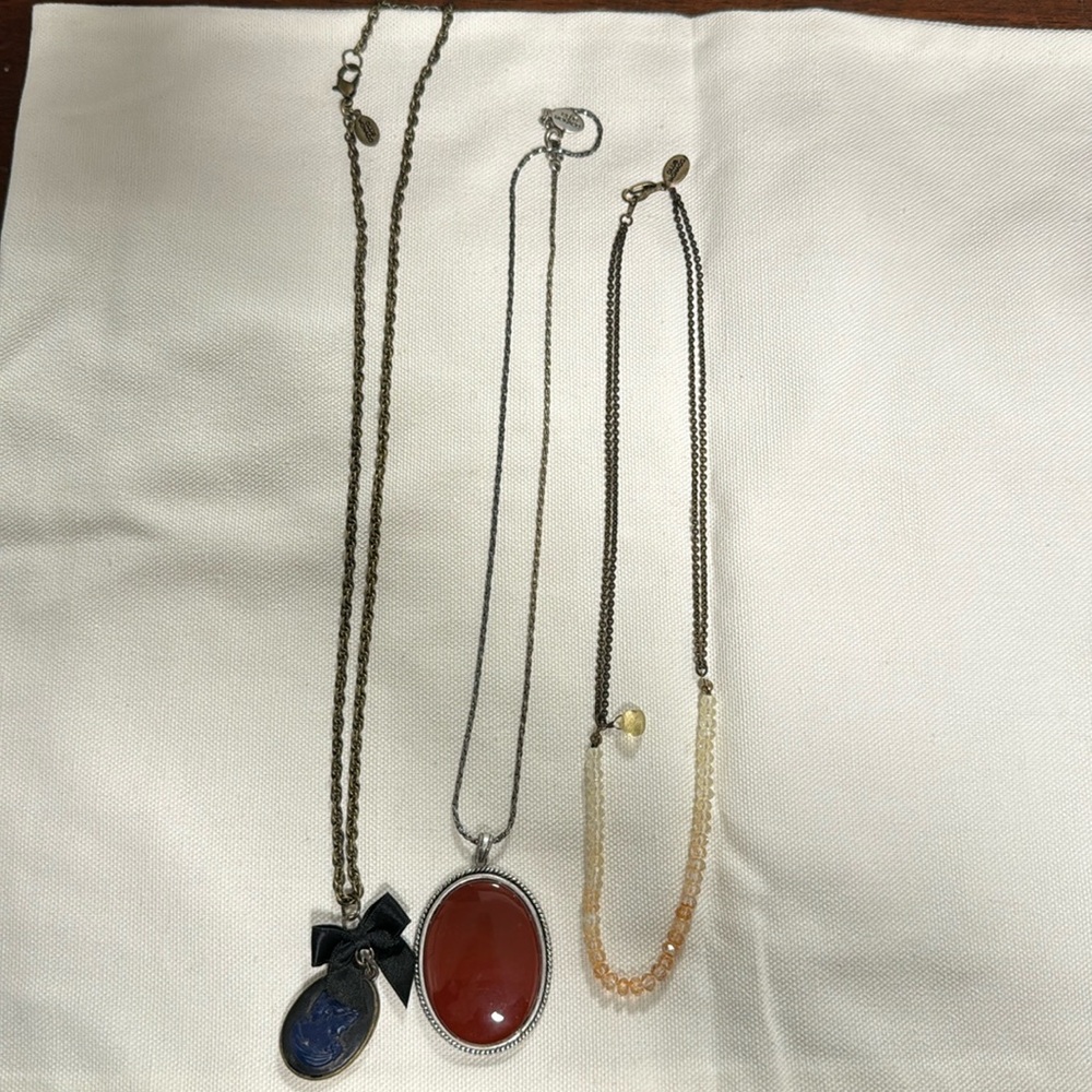 Al three necklaces are from Club Monaco.